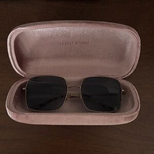 Miu Miu Black Sunglasses with Gold Frame